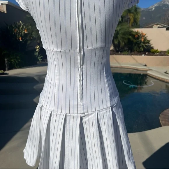 B. Darlin
Pinstripe Square Neck Mini Dress Tie Back Empire Waist
Size 3/4 - Picture 7 of 15